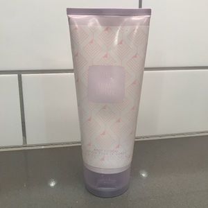 Ari by Ariana Grande body lotion and purse